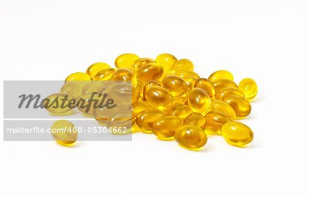 Close up of yellow gel capsules.