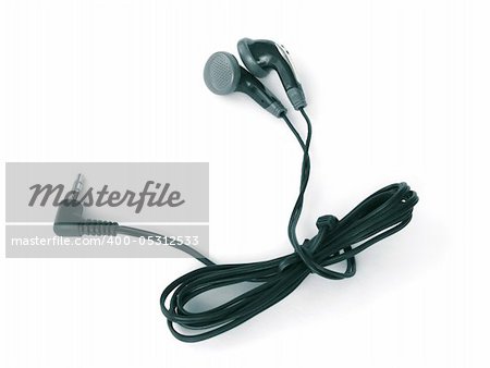 Black tiny earphones isolated on white