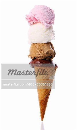 Waffle cone with four scoops of ice cream isolated on white