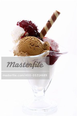 Ice cream dessert with raspberry jam on white background