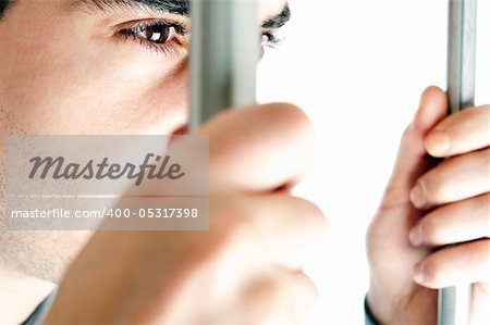 Isolated young man in jail