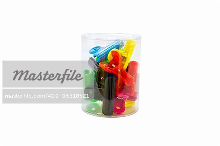 Plastic paper clip on white background in box