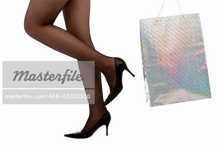 woman carrying shopping bag, isolated on white background