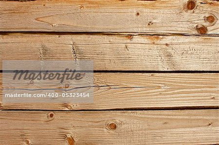 Horizontal parallel wooden old logs. Part of wooden house walls