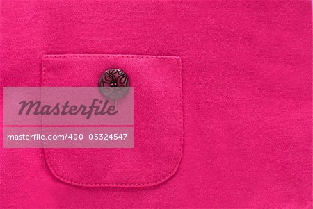 Pocket with a button on a pink textile