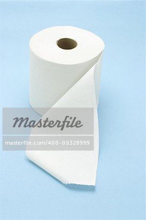 White toilet roll on seamless blue background