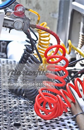 colorful Pneumatic hoses between the truck and trailer