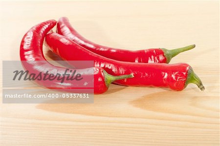Red pepper on a wooden table