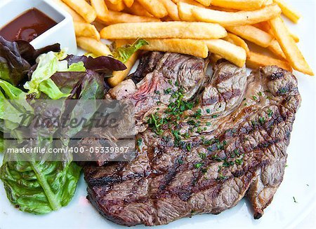 juicy steak beef meat with tomato and potatoes