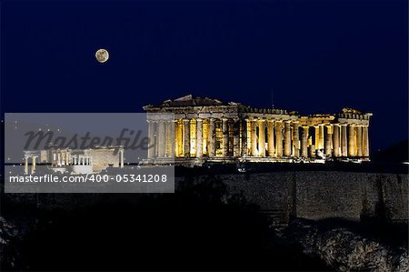 Acropolis (parthenon) by night, under full moon,  Athens, Greece