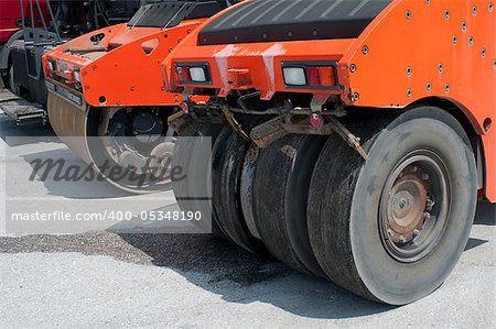 Two asphalt rollers close-up