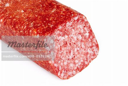 Close-up image of a salami isolated on a white background