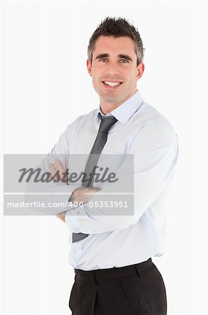 Portrait of a senior manager posing against white background