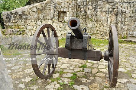 ancient gun at an castle ruins, photo taken in Strecno, Slovakia.