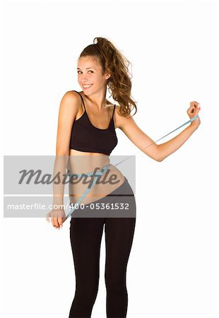 Girl showing how much weight she lost isolated on white