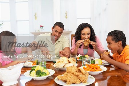 Family Having A Meal Together At Home
