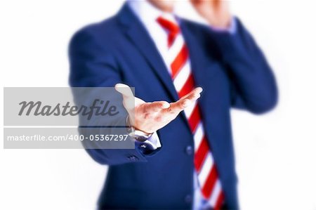 Manager holding something on his hand while talking on the phone