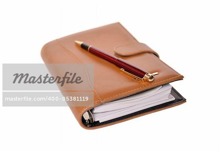 Daily planner with pen isolated on white background