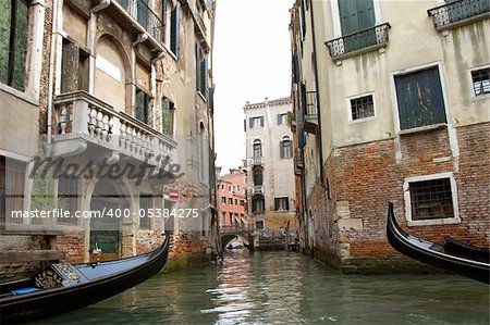 water canal between old buildings in Venice