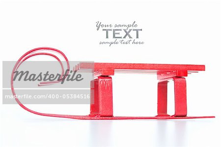 Red sledge isolated on white