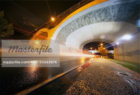 Night urban scene with tunnel