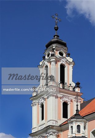 Fragment of Catholic Church in baroque style with great number architectural details and embellishments. Vilnius, Lithuania.