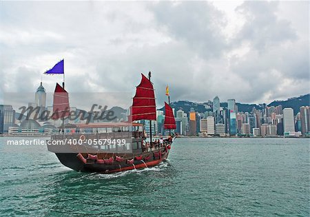 Hong Kong harbour with tourist junk