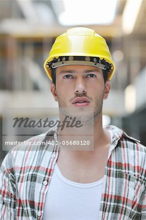 handsome hard worker people portrait at concstruction site