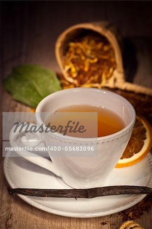 tea time set with flavors on wooden background