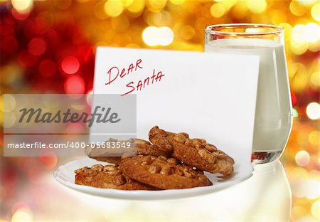 Cookies and milk for Santa on the christmas background