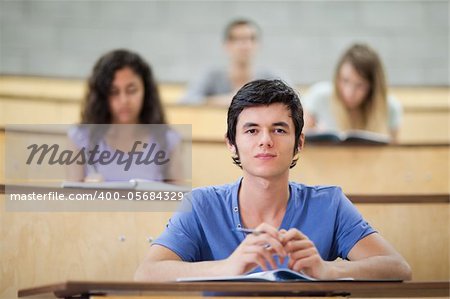 Focused students during a lecture in an amphitheater