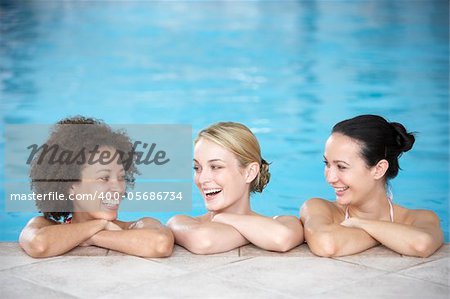 Three Female Friends In Swimming Pool