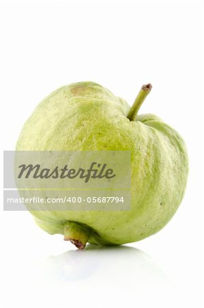 Single organic guava fruit on white background