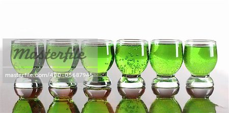 Color photo of a glass cup with tequila