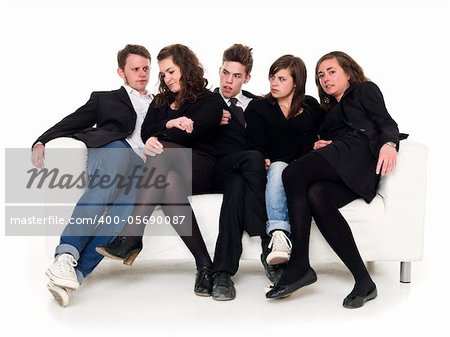 Group of people in a sofa isolated on white background