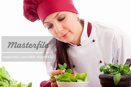 photo of succesfull female restaurant chef on white background