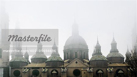 Detail of the domes of ancient architecture with fog