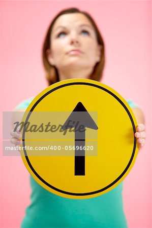 Woman Holding Road Traffic Sign