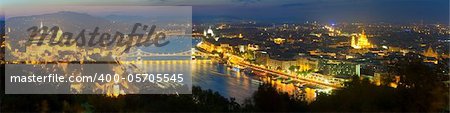 Budapest night panorama view. Long exposure (trees in the foreground out of focus and some in motion blur).