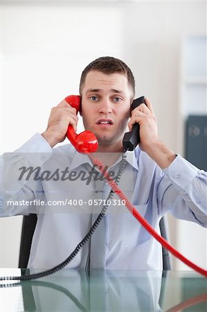 Businessman stressed with the telephone