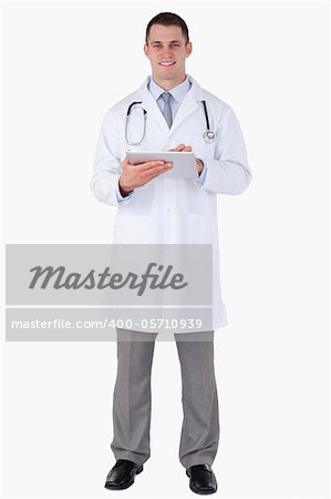 Doctor standing on white background