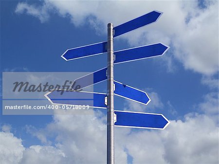 Blue Blank directions Signs over cloudy Sky