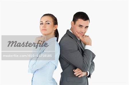 Business partners back-to-back in thoughts against a white background