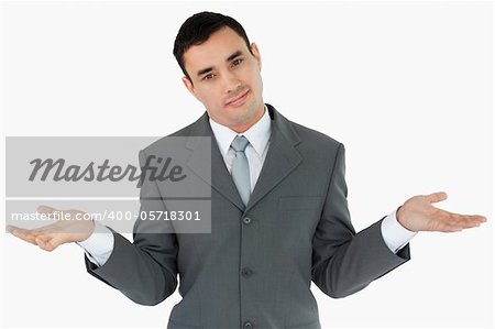 Businessman clueless against a white background