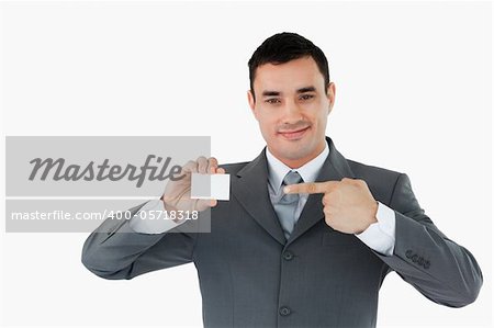 Businessman pointing at his businesscard