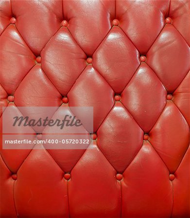 Texture of red leather vintage sofa for background