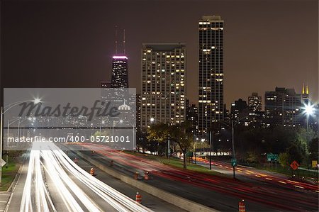 Image of Lake Shore Drive Highway leading to the city of Chicago at night.