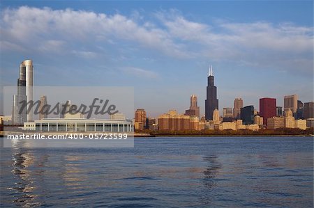 Image of famous Chicago skyline at autumn sunrise.