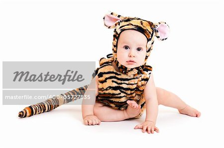 Portrait of cute little boy in tiger costume