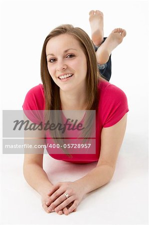 Teenage Girl Laying On Stomach